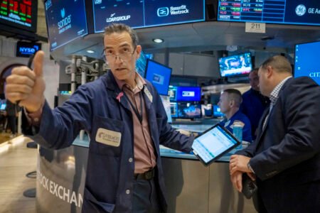 Dow hits fresh record, Nvidia and chip stocks jump