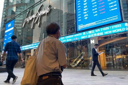 Asian shares are mostly higher after strong earnings boost stocks on Wall St